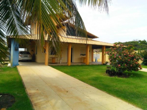 Casa de praia condomínio fechado, frente para o mar